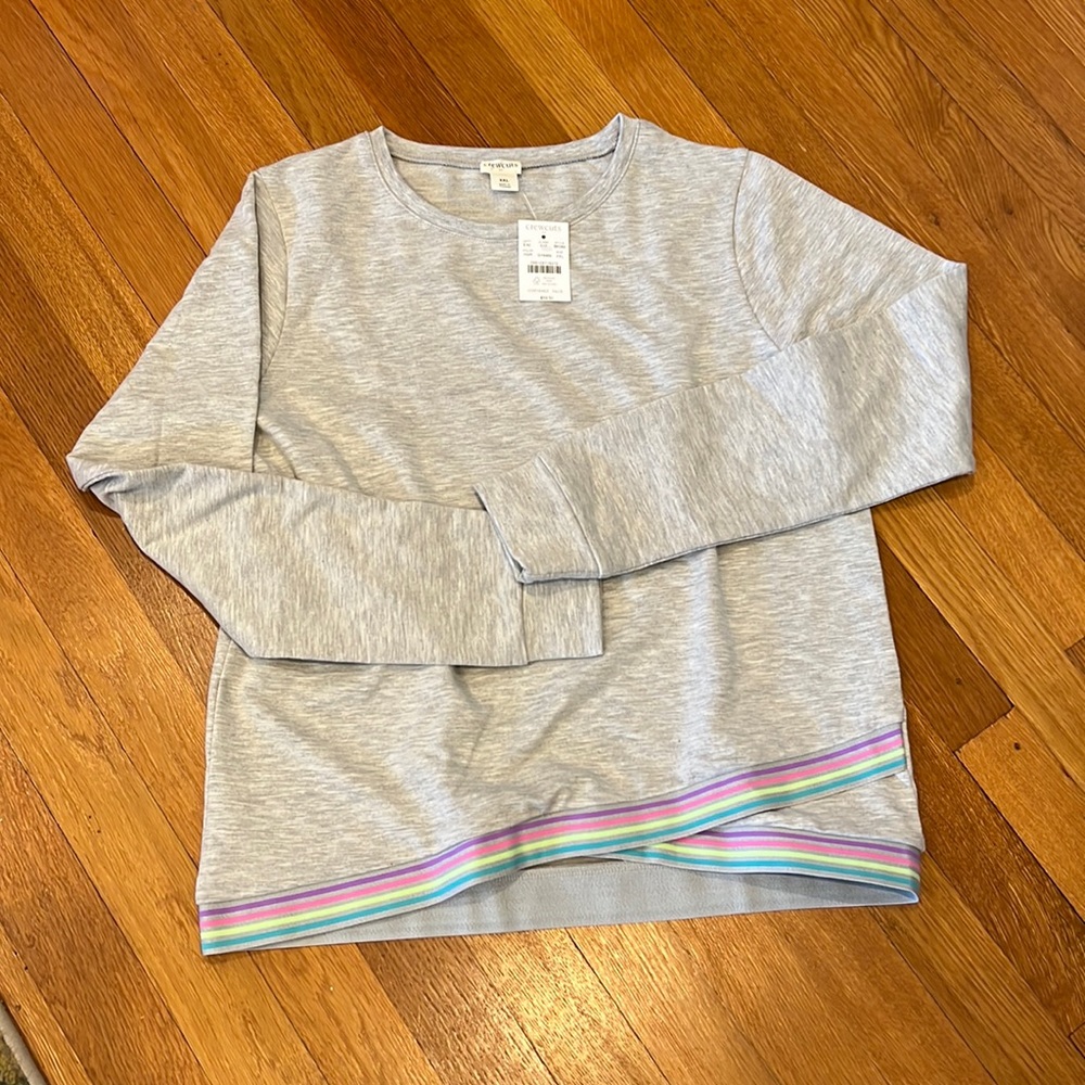 NWT girls' crew neck sweatshirt with rainbow hem. Size XXL.